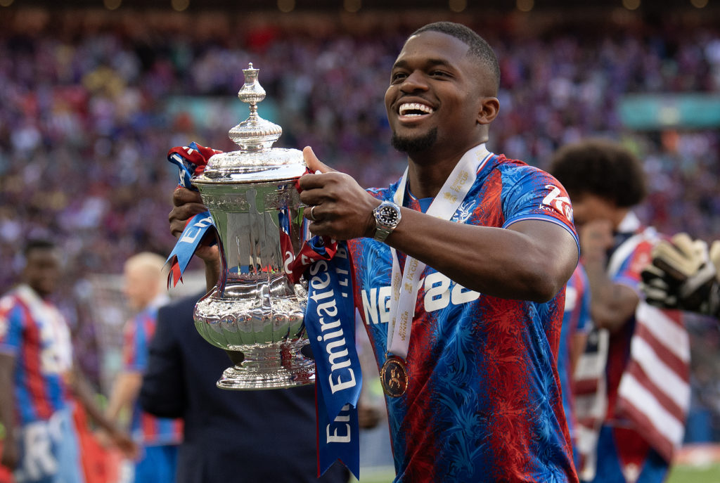 Cheick Doucoure celebrates after Crystal Palace win the FA Cup
