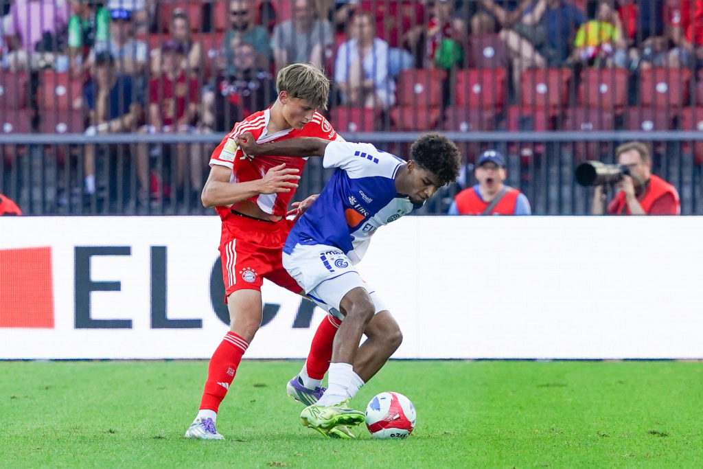 Magnus Dalipiaz of Bayern Munich (L) competes against Luke Plange of Grasshopper Club Zurich.