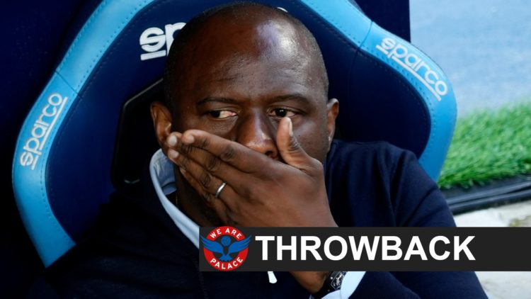 Genoa manager Patrick Vieira sits on the touchline.