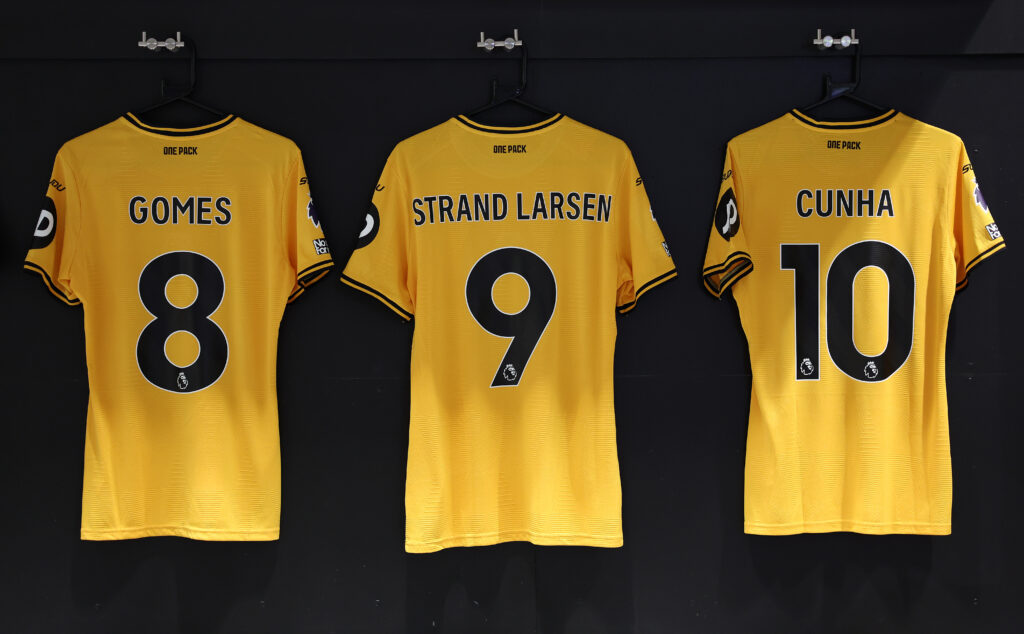 Wolves shirts hanging up in dressing room