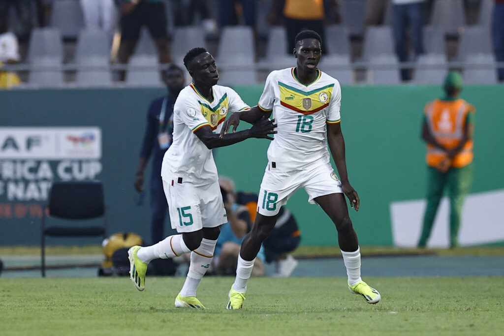 Krepin Diatta and Ismaila Sarr celebrate for Senegal